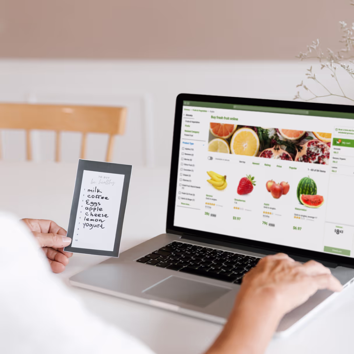 a woman ordering grocery online on her personal computer