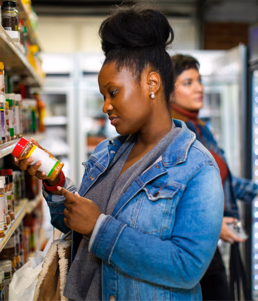 a photo of woman buying groceries