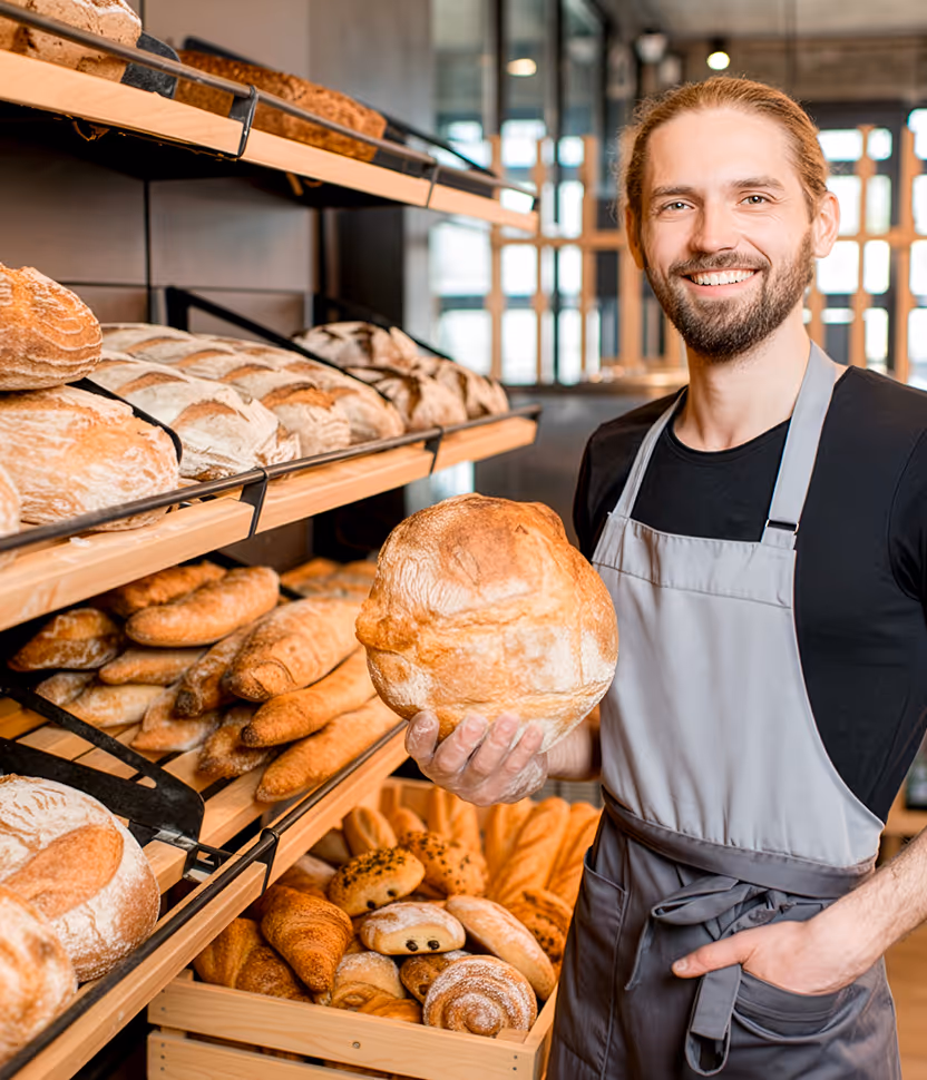 a photo of a baker in a bakery